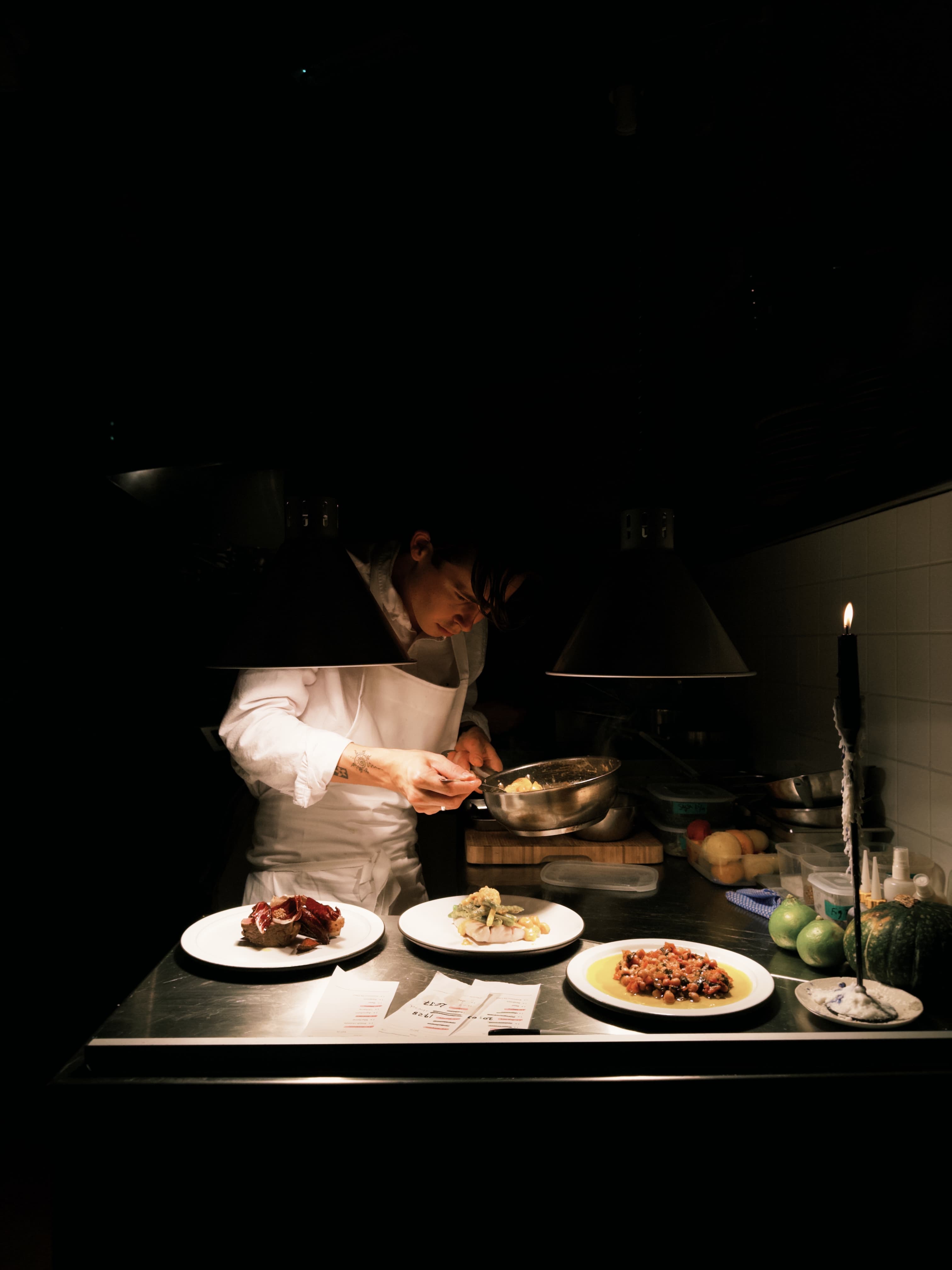 Plating a dish in the kitchen
